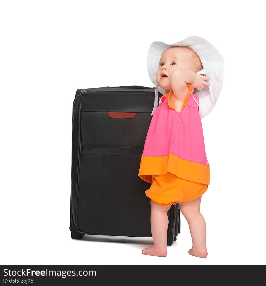 Little baby girl with baggage suitcase isolated on white background