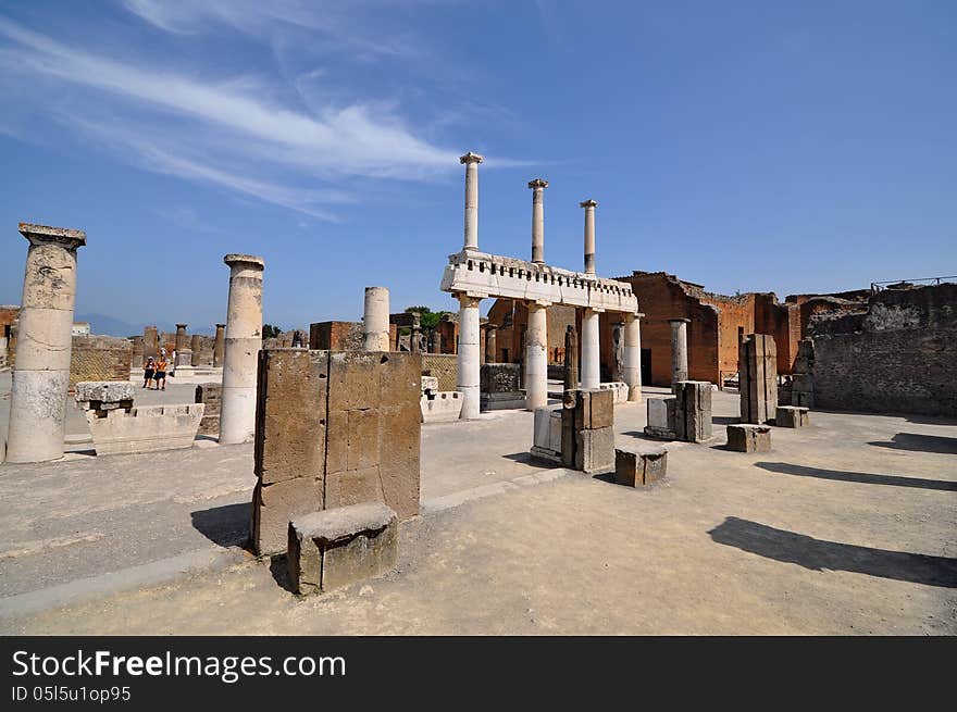 Blue sky and the acient Roman ruins of Pompeii.