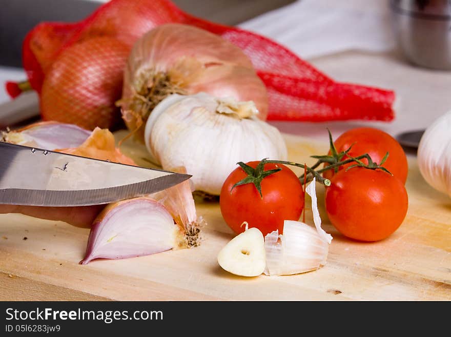 Cutting spices to prepare a spicy plate