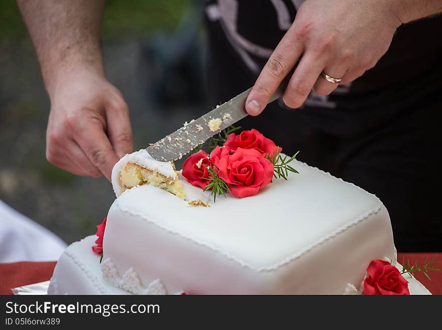 Cutting the wedding cake in out