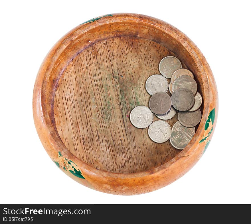 The wooden bowl with money