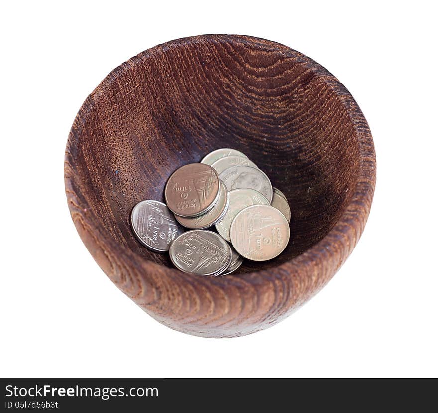 The wooden bowl with money