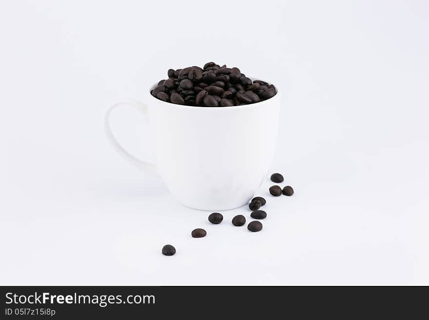 Cofee beans in the cup