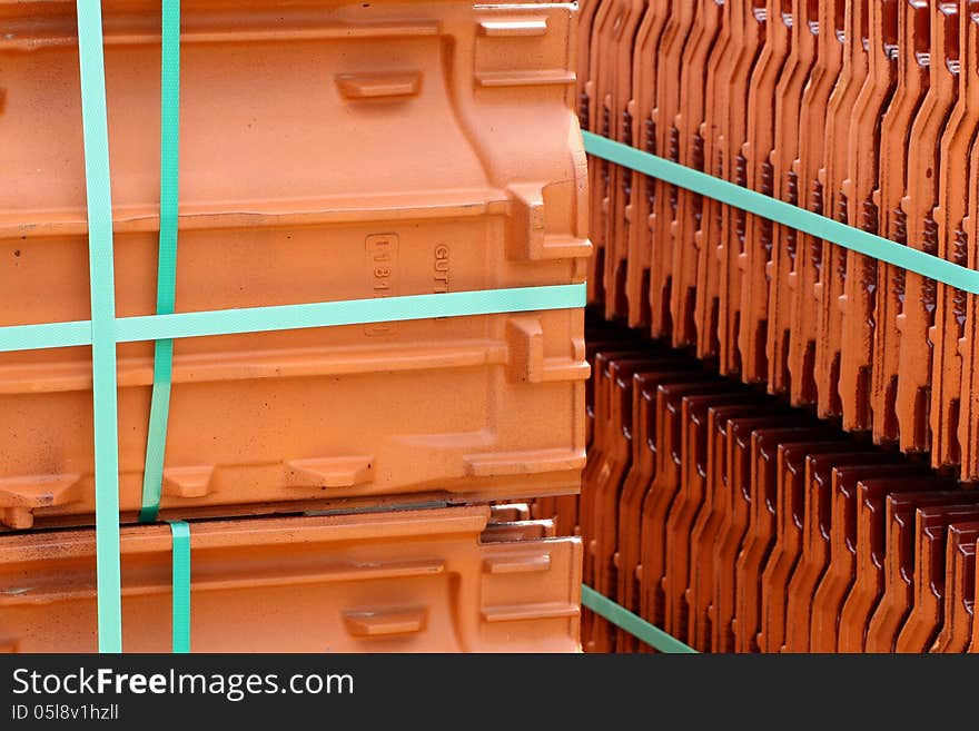 Pile of red roof tiles