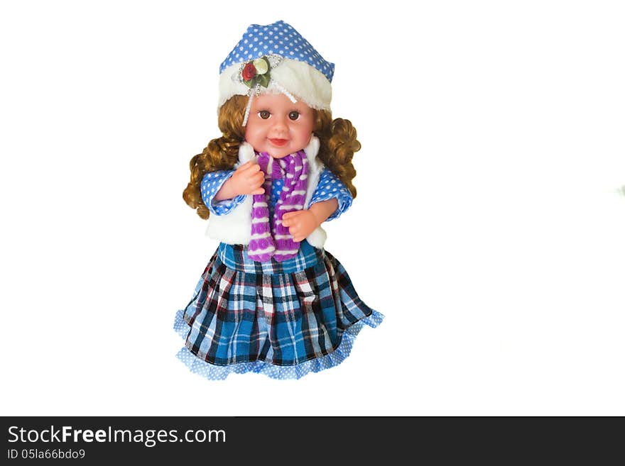 The doll in a beautiful dress, cap , with long hair. The doll in a beautiful dress, cap , with long hair