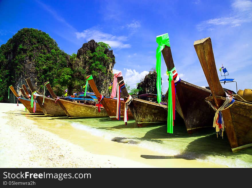 Long tail boat on beautiful tropical beach