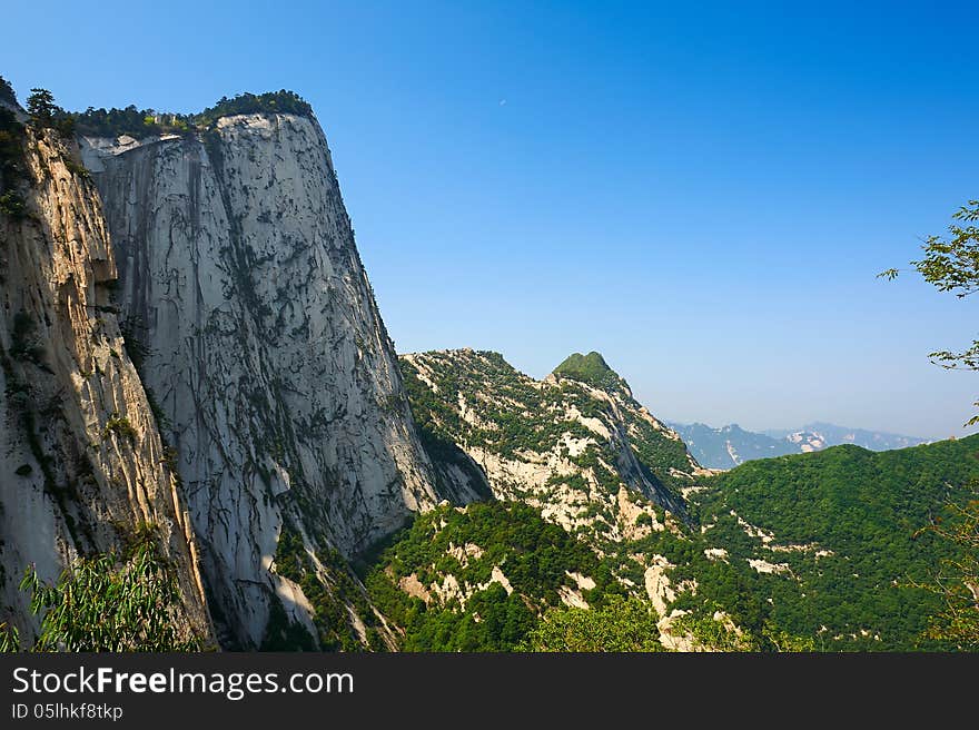 The image taken in chinas shanxi province xian city Hua mountain scenic spot.Time is in 2013 at the beginning of May.Hua mountain consists of five peaks, is Chinas most unique mountain scenic area. The image taken in chinas shanxi province xian city Hua mountain scenic spot.Time is in 2013 at the beginning of May.Hua mountain consists of five peaks, is Chinas most unique mountain scenic area.