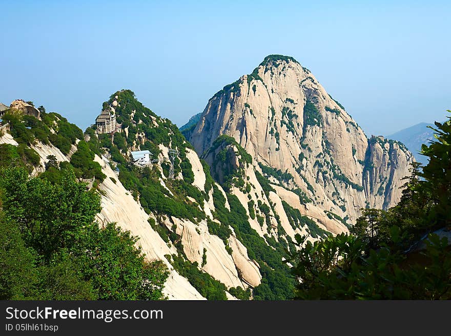 The image taken in chinas shanxi province xian city Hua mountain scenic spot.Time is in 2013 at the beginning of May.Hua mountain consists of five peaks, is Chinas most unique mountain scenic area. The image taken in chinas shanxi province xian city Hua mountain scenic spot.Time is in 2013 at the beginning of May.Hua mountain consists of five peaks, is Chinas most unique mountain scenic area.