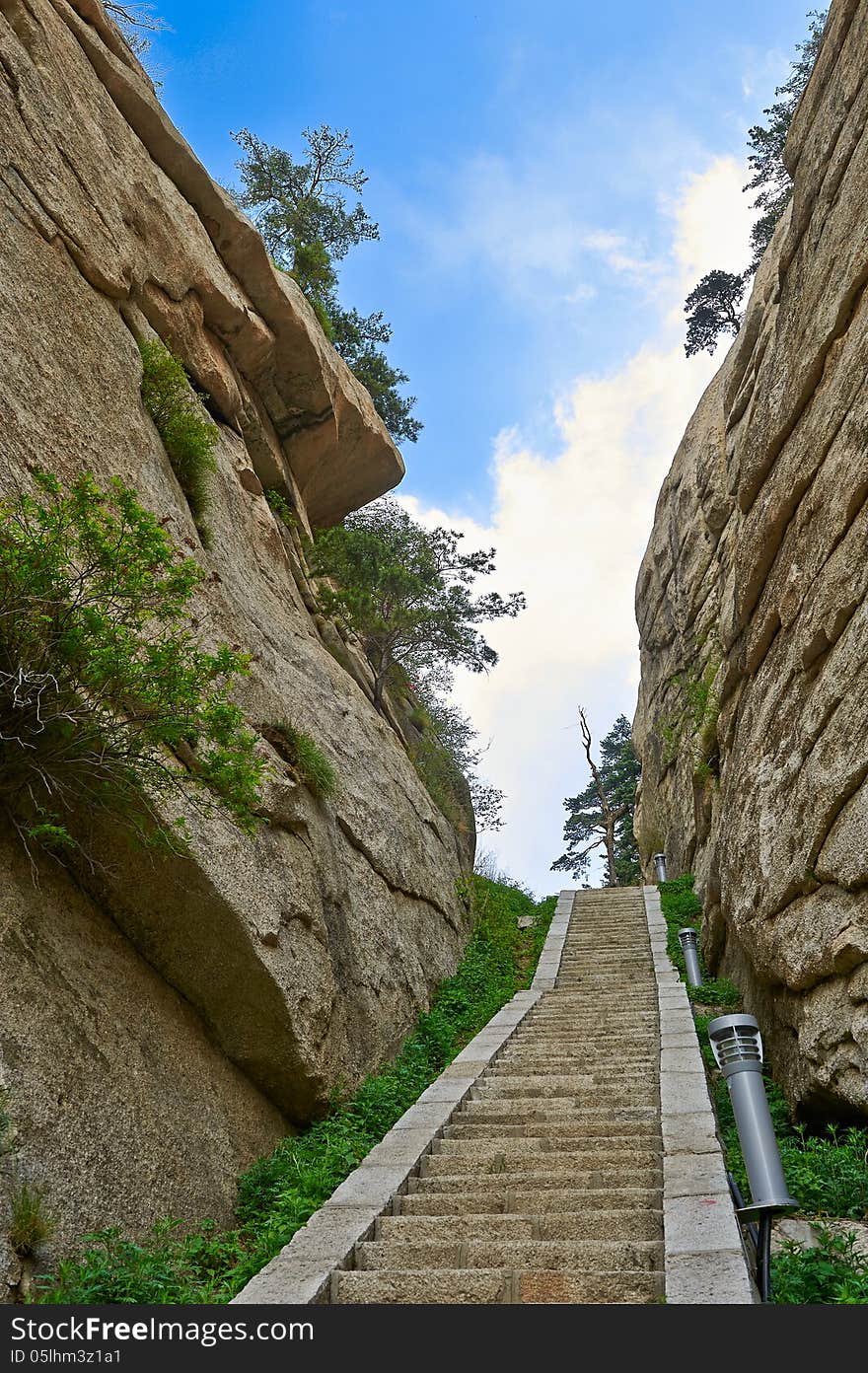 The image taken in chinas shanxi province xian city Hua mountain scenic spot.Time is in 2013 at the beginning of May.Hua mountain consists of five peaks, is Chinas most unique mountain scenic area. The image taken in chinas shanxi province xian city Hua mountain scenic spot.Time is in 2013 at the beginning of May.Hua mountain consists of five peaks, is Chinas most unique mountain scenic area.