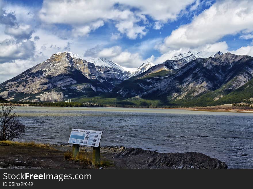 Lac des Arcs with part of the Canadian rocky mountains in the background thru a fisheye lens. Lac des Arcs with part of the Canadian rocky mountains in the background thru a fisheye lens