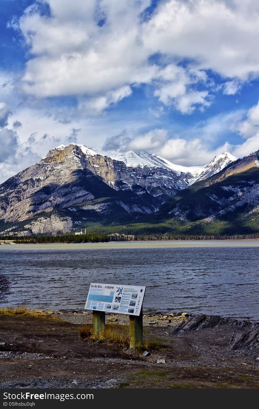 Lac des Arcs with part of the Canadian rocky mountains in the background thru a fisheye lens. Lac des Arcs with part of the Canadian rocky mountains in the background thru a fisheye lens