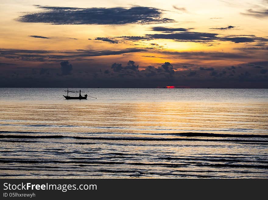 Sunrise over the beach at low tide