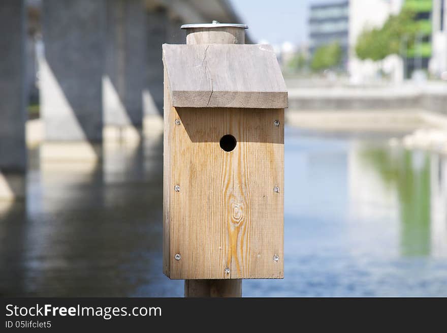 A rustic-looking bird house. A rustic-looking bird house