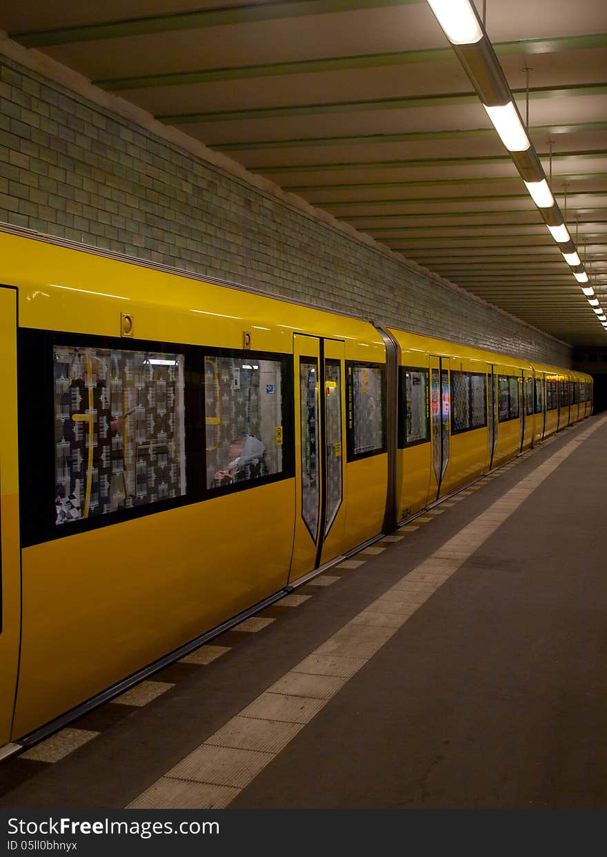 Deserted subway station with train