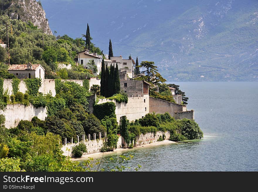 Image shows Limone on the left, Lake Garda in the middle, some mountains on the right. Image shows Limone on the left, Lake Garda in the middle, some mountains on the right.