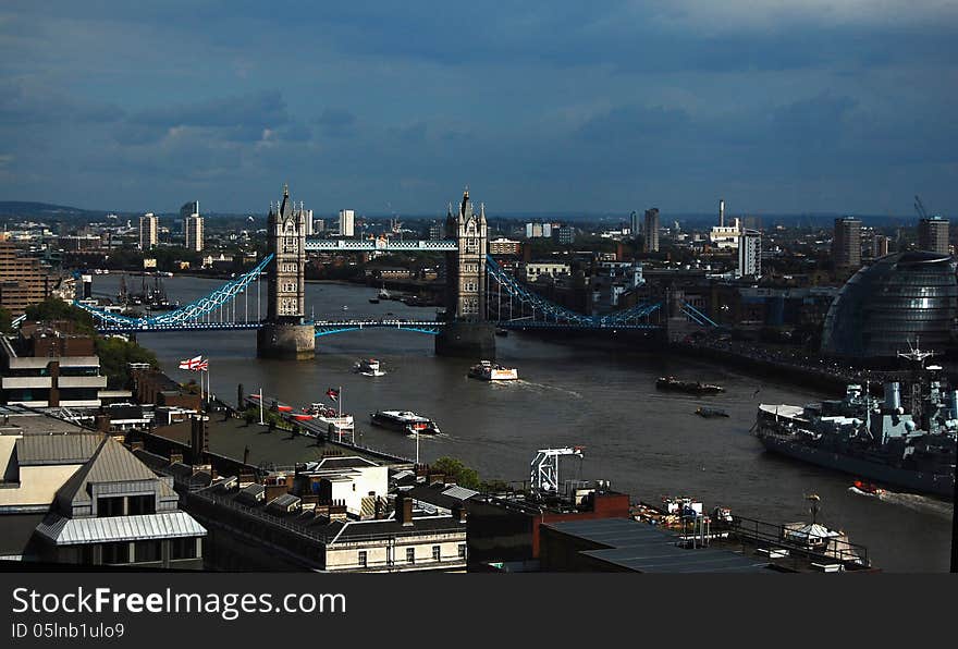 A picture of the London Bridge with other elements of the city