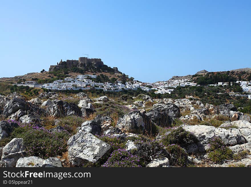 Landscape of the island of Rhodes with a view of the castle and the town of Lindos. Landscape of the island of Rhodes with a view of the castle and the town of Lindos