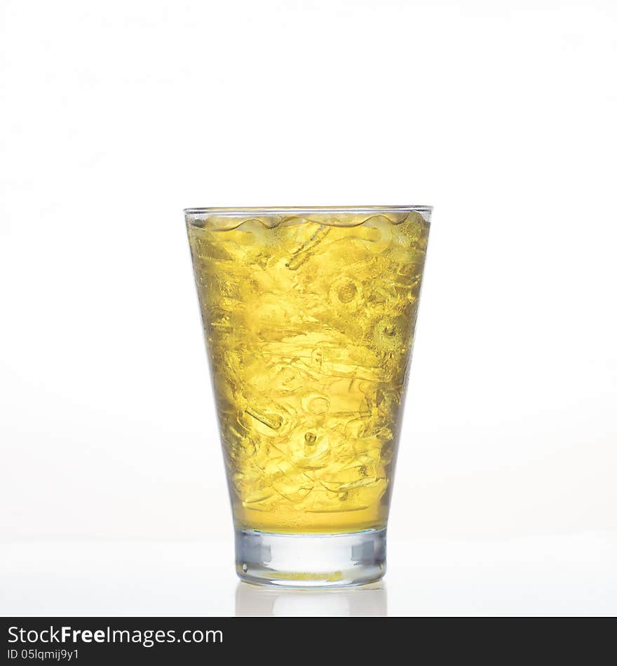 Chrysanthemum cold herbal drink in glass on white background