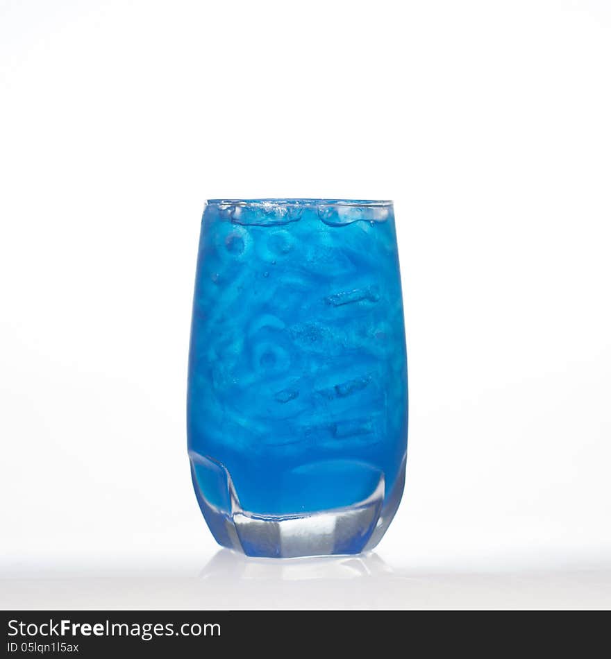 Blueberry flavour aerated drinks with ice in glass on white background