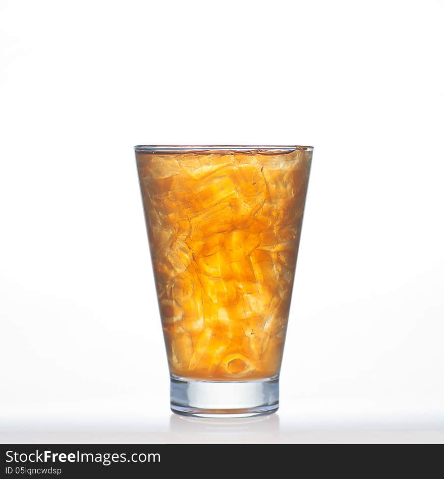 Lemon tea Thai drinks style with ice in glass on white background. Lemon tea Thai drinks style with ice in glass on white background