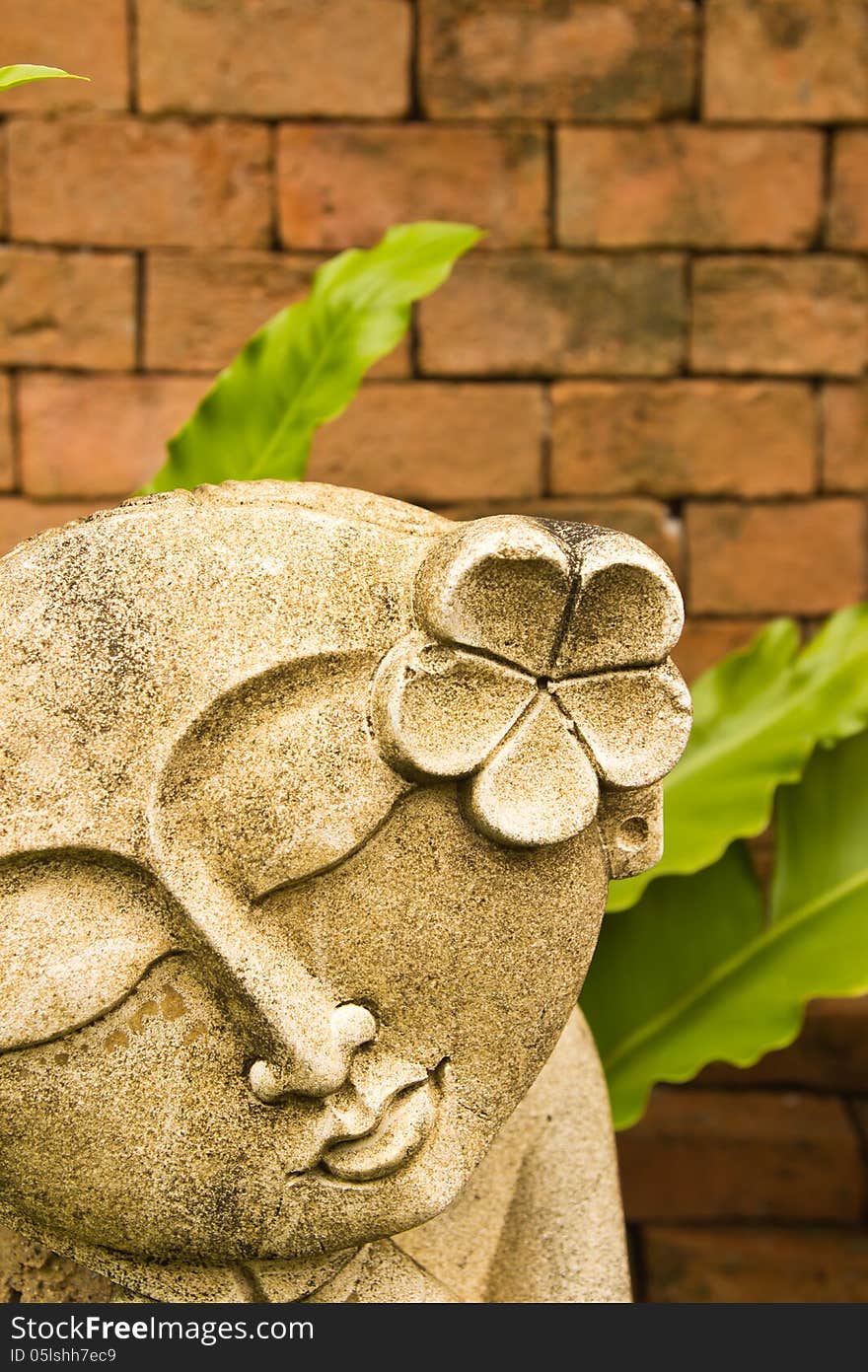 Femal Statue  With Brown Background.