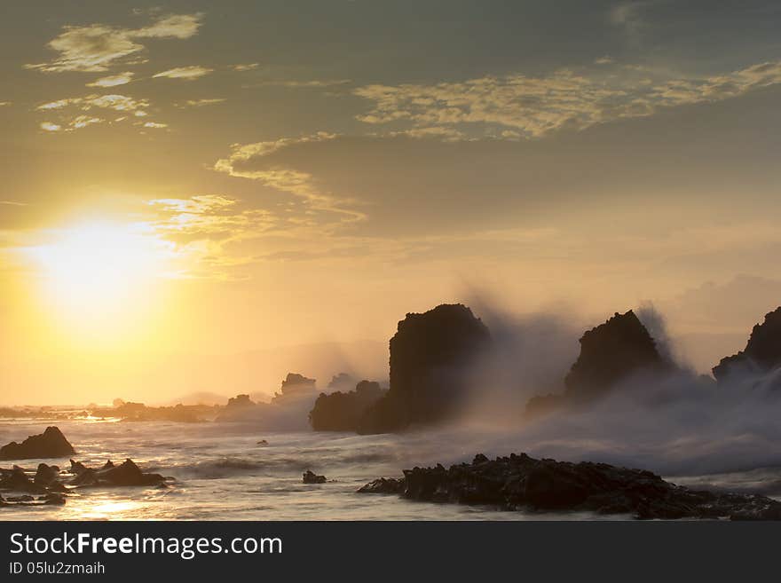 Golden Morning at the beach with waves hit reefs. Golden Morning at the beach with waves hit reefs