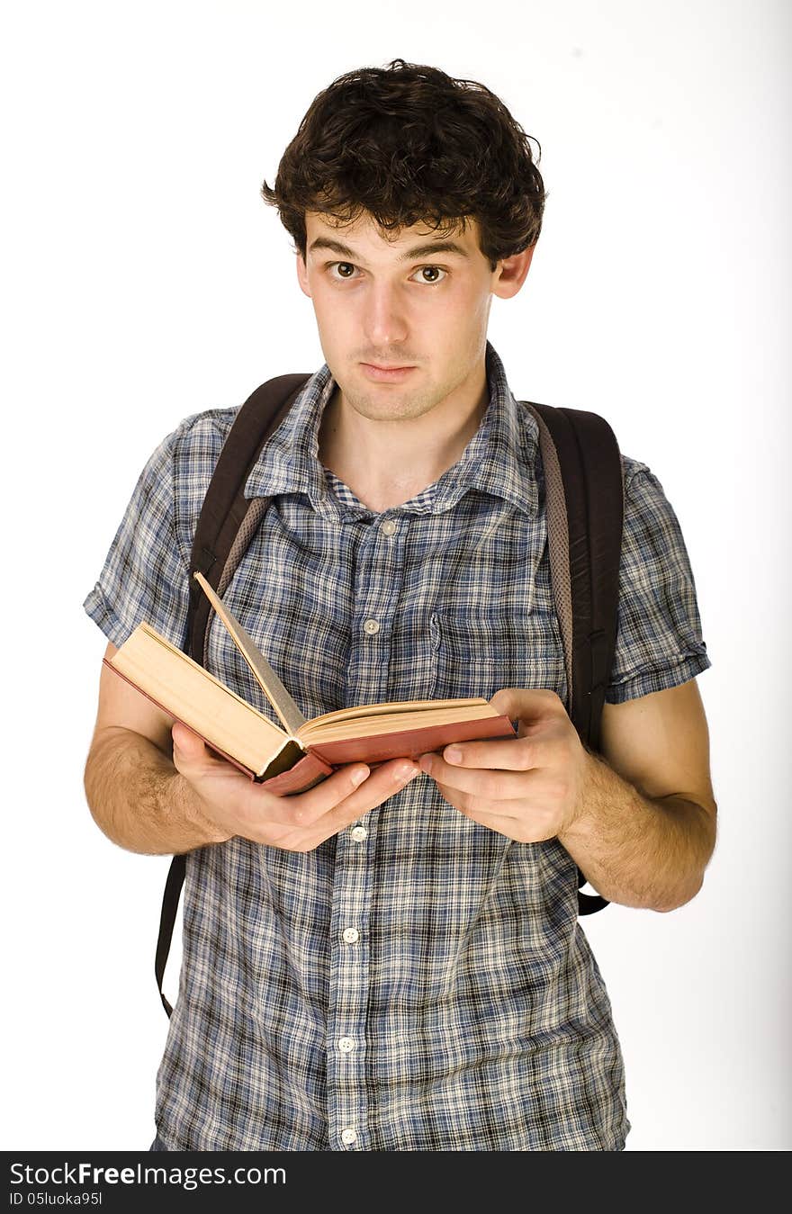 Young Happy Student Carrying Bag And Books