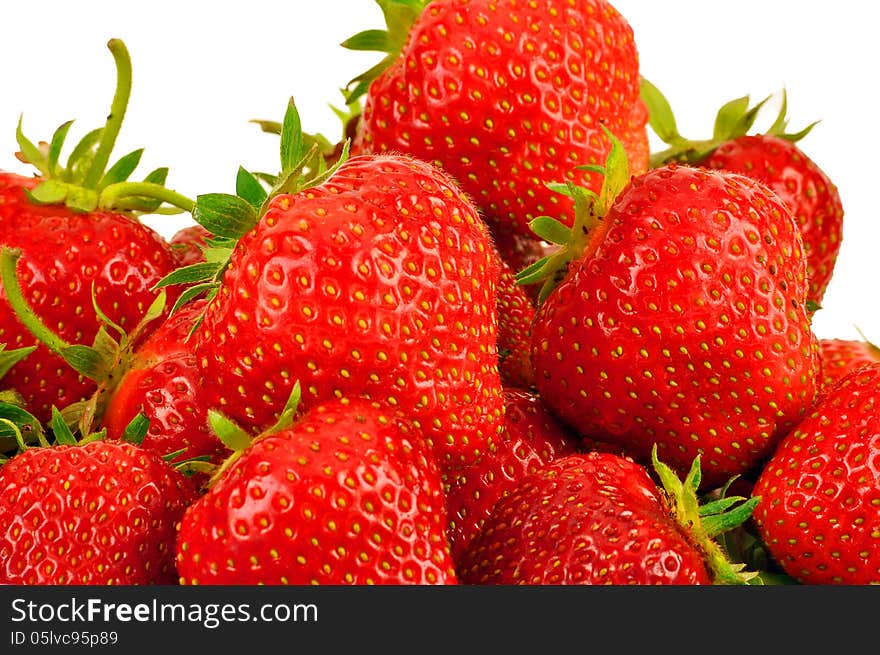 Lots of fresh strawberries on white background