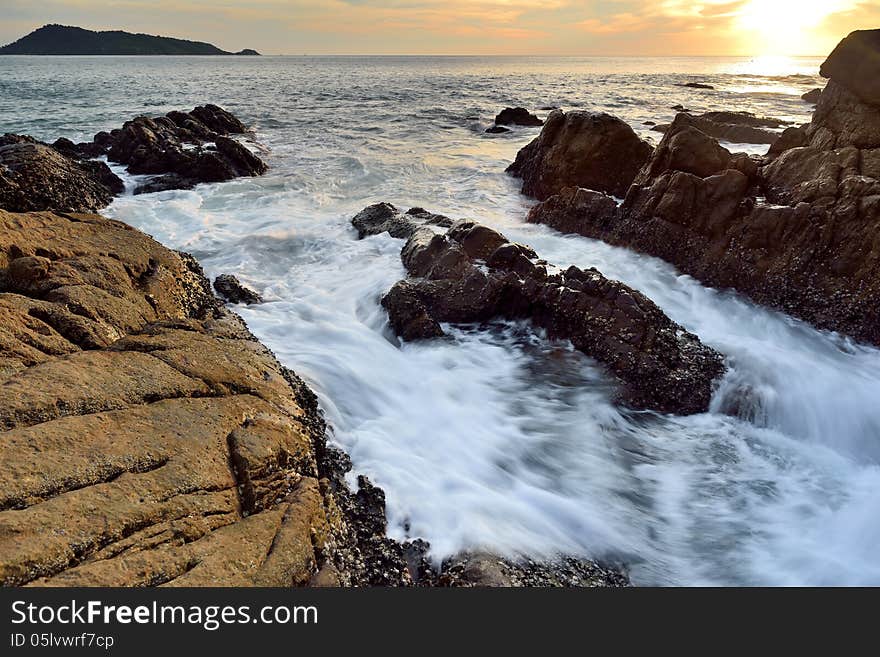 Sea waves lash line impact rock on the beach. Sea waves lash line impact rock on the beach