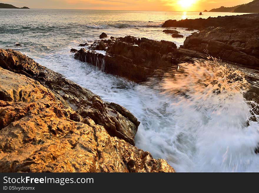 Sea waves lash line impact rock on the beach. Sea waves lash line impact rock on the beach