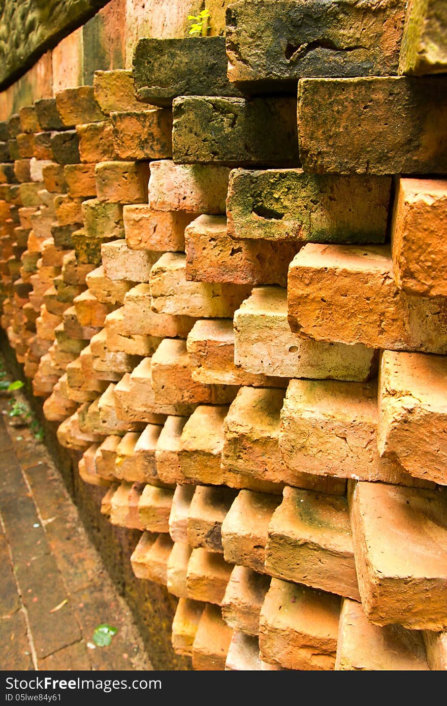 Brick Wall. Old Dark Red Bricks with Cracks and Dirt Spots. Brick Wall. Old Dark Red Bricks with Cracks and Dirt Spots.