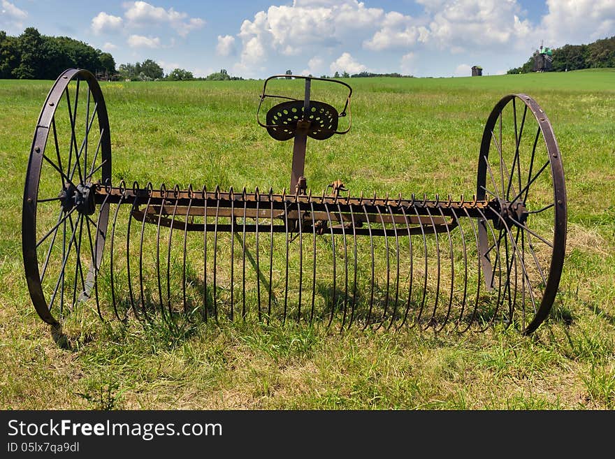 Rusty harrow plow back