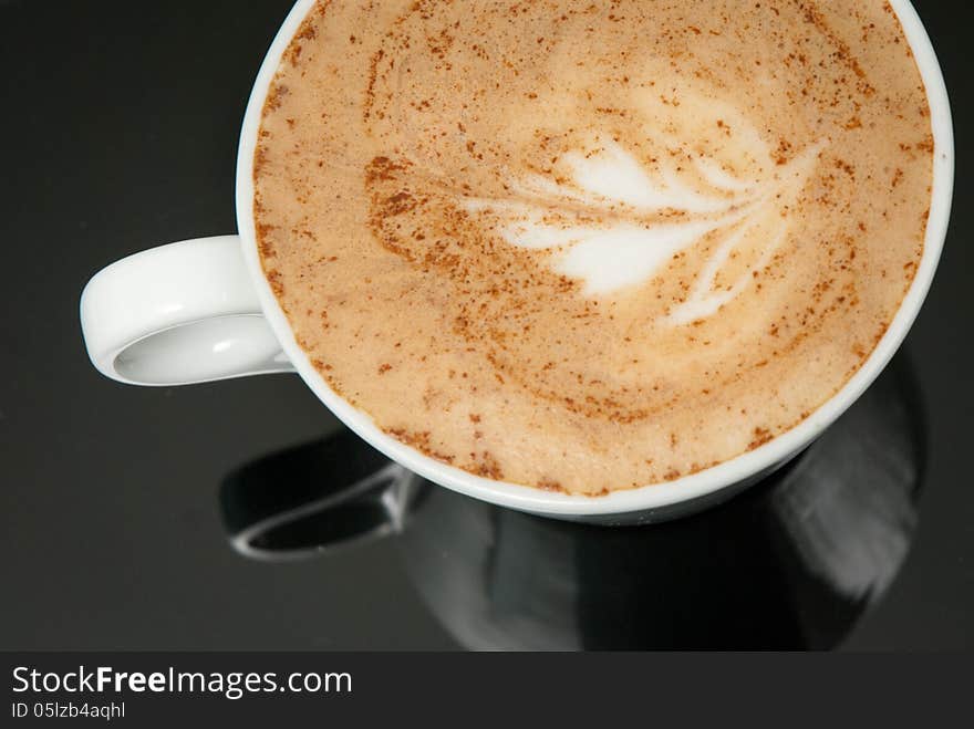 White Coffe Cup On The Black Background