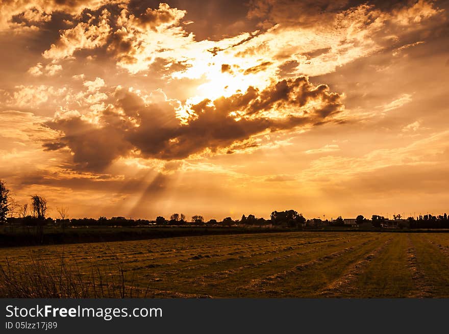 Sun rays through the clouds after a storm. Sun rays through the clouds after a storm