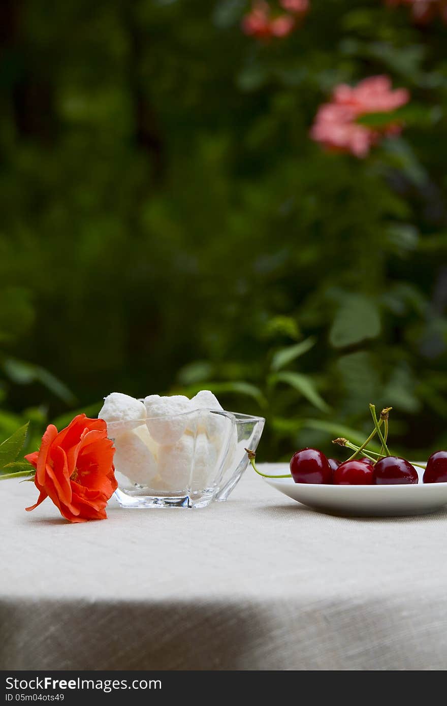 Beautiful summer breakfast - cherries, sweets