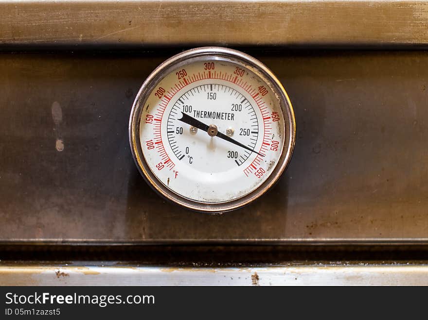 The temperature gauge on an oven