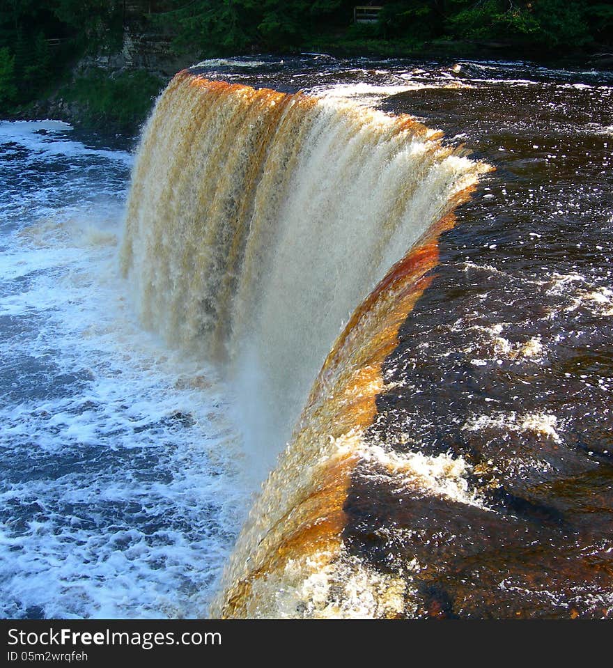 Tahquamenon Falls and Rapids on river in Upper Peninsula, Michigan. Tahquamenon Falls and Rapids on river in Upper Peninsula, Michigan