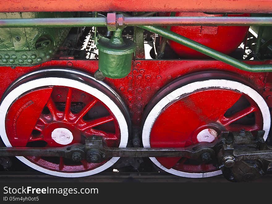 Wheels of the old steam locomotive close up