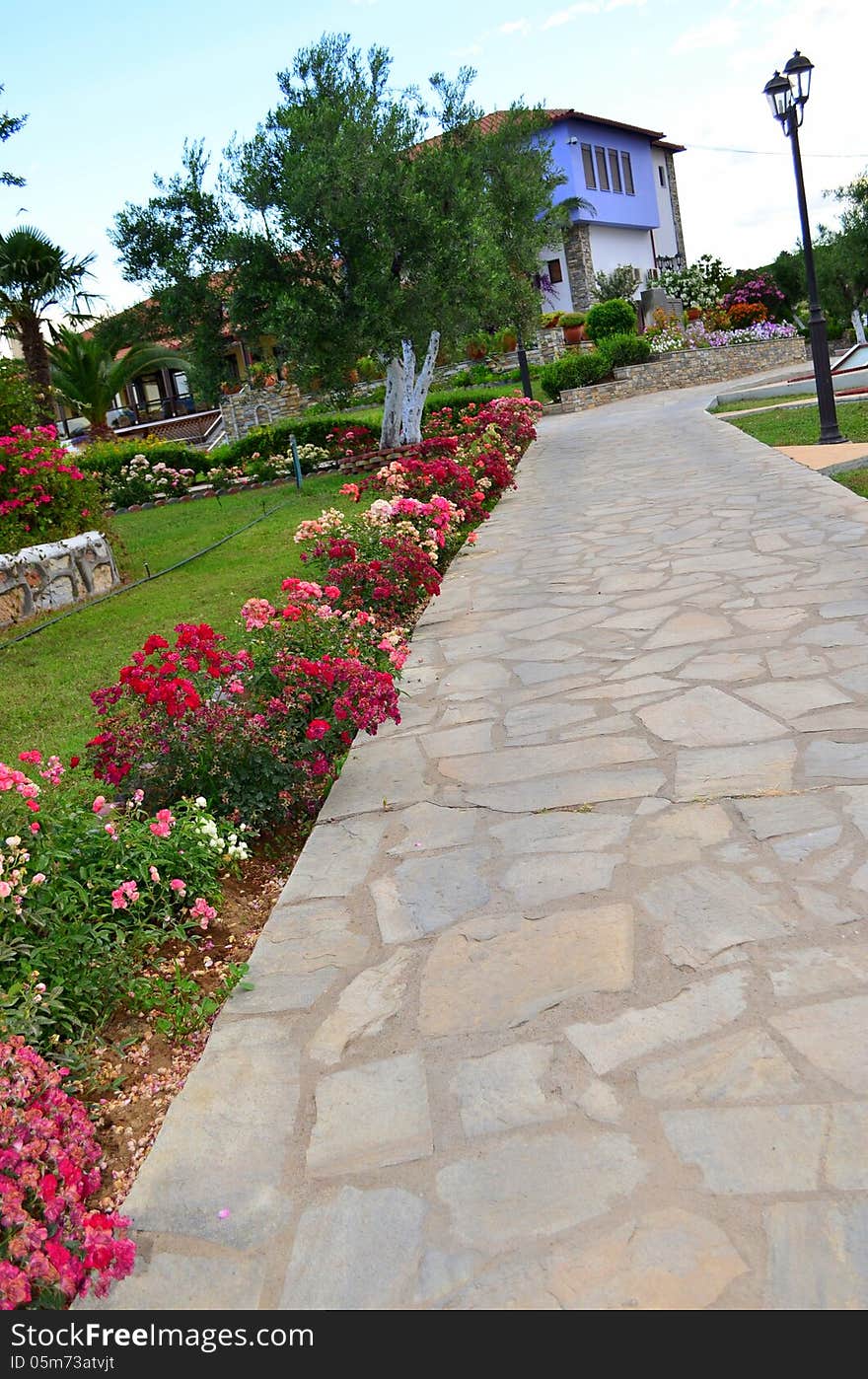 Image of an alley of a holiday resort. Image of an alley of a holiday resort