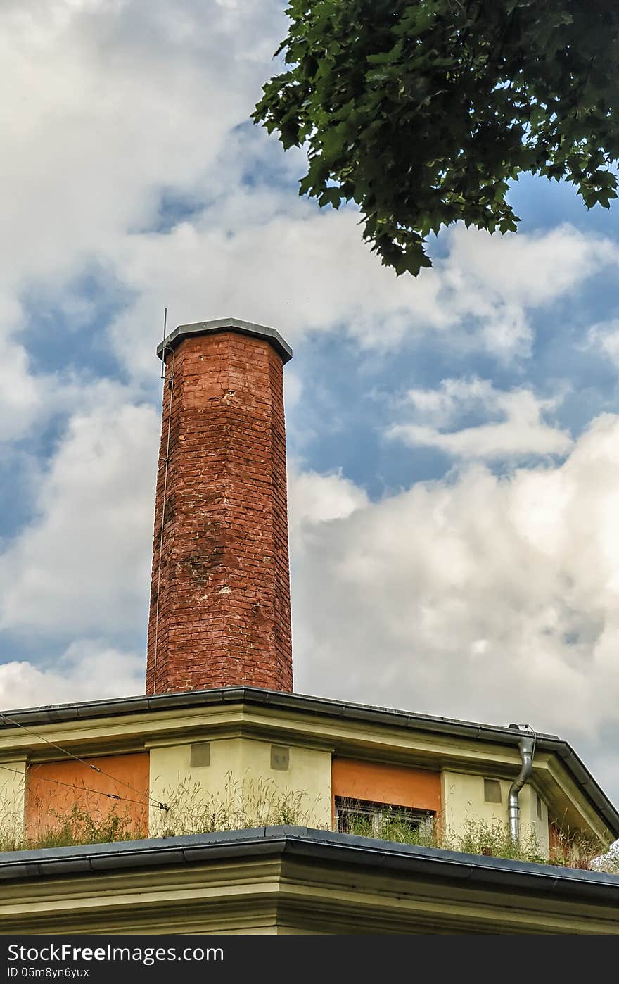 An old red circular chimney. An old red circular chimney.