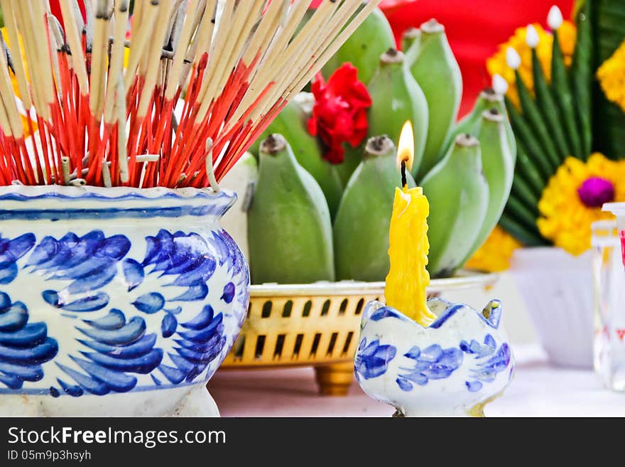 Incense pot andCandles burning