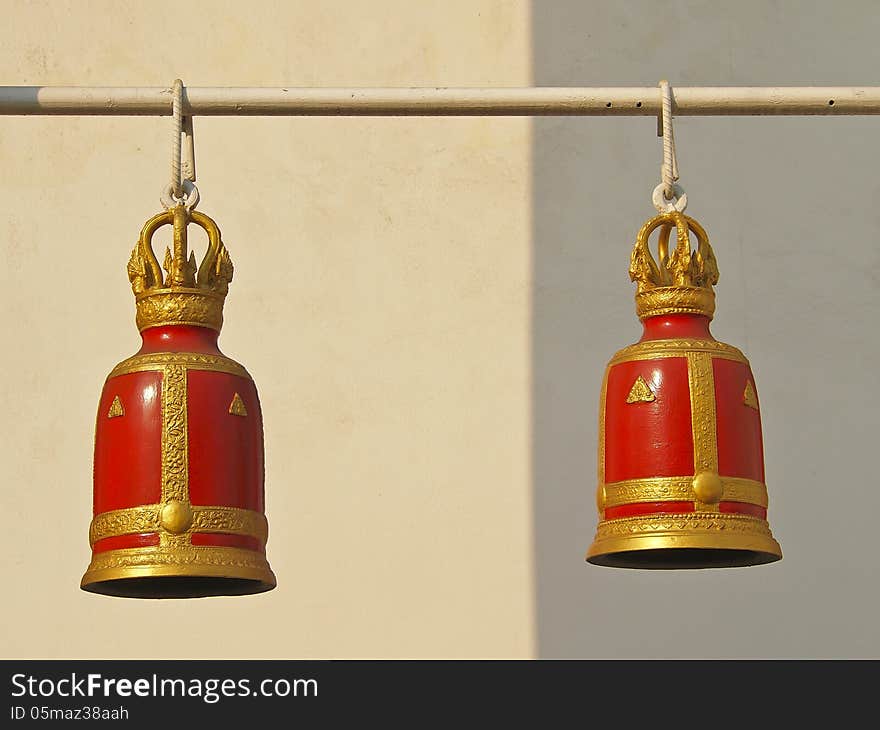 Pairs of decorative ancient red bell in Thai temple. Pairs of decorative ancient red bell in Thai temple