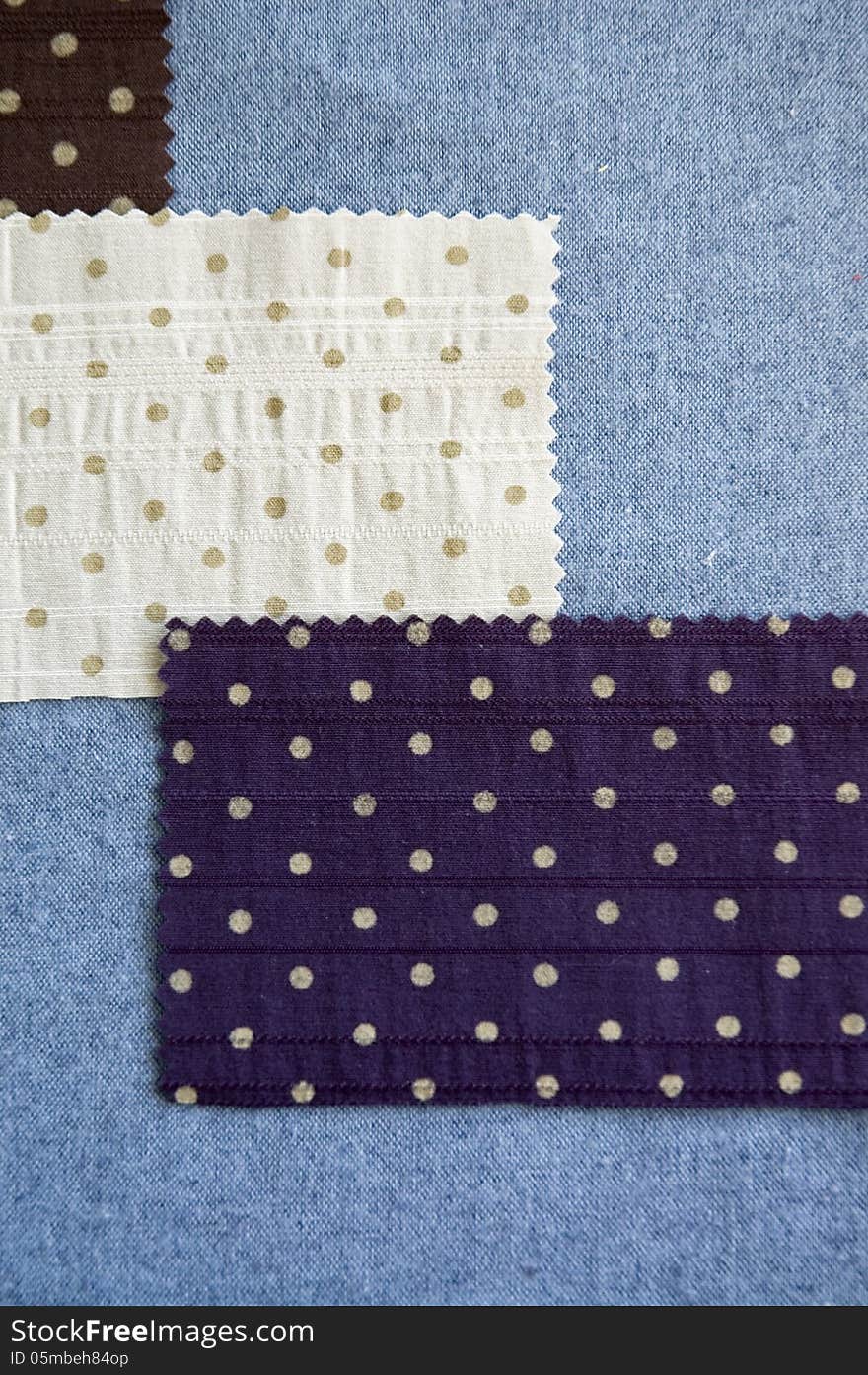 Polka dots on white and blue fabric