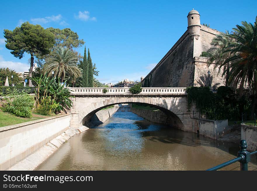 Canal Torrent de Sa Riera and medieval building containing the Museum of Contemporary Art Es Baluard in Palma de Mallorca, Spain. Canal Torrent de Sa Riera and medieval building containing the Museum of Contemporary Art Es Baluard in Palma de Mallorca, Spain.