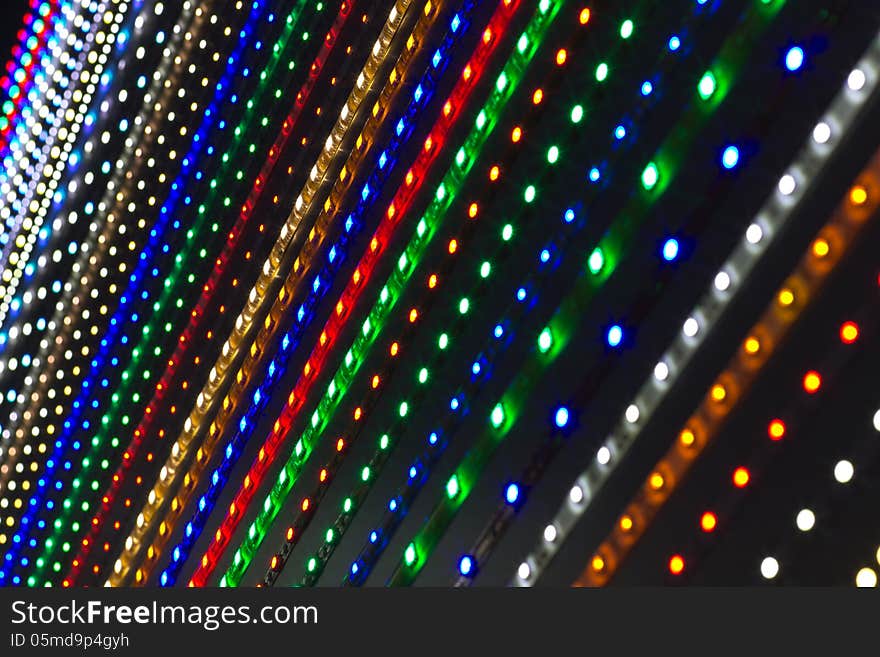 Detail of a flexible color ropes lights switched on in the dark. Detail of a flexible color ropes lights switched on in the dark