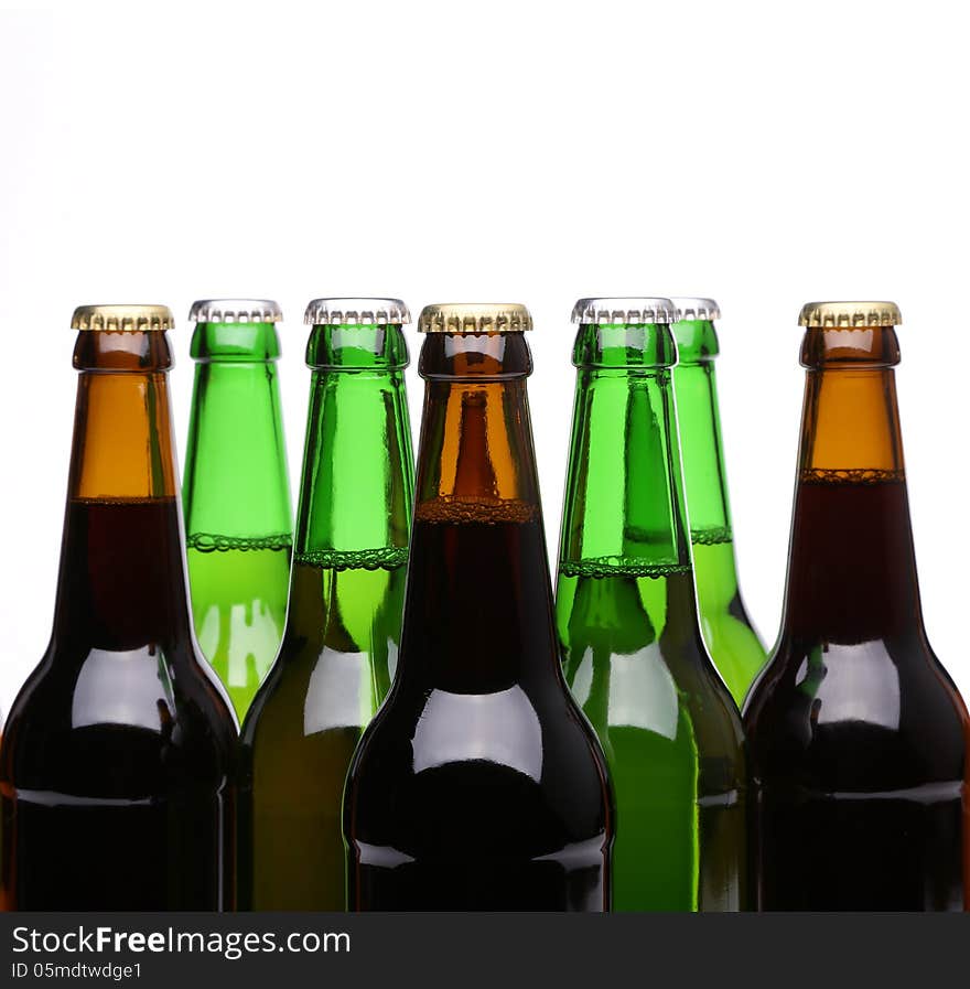 Closed bottles of beer isolated on a white background