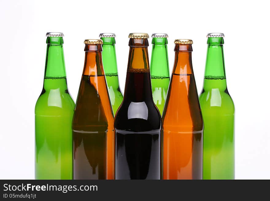 Closed bottles of beer isolated on a white background