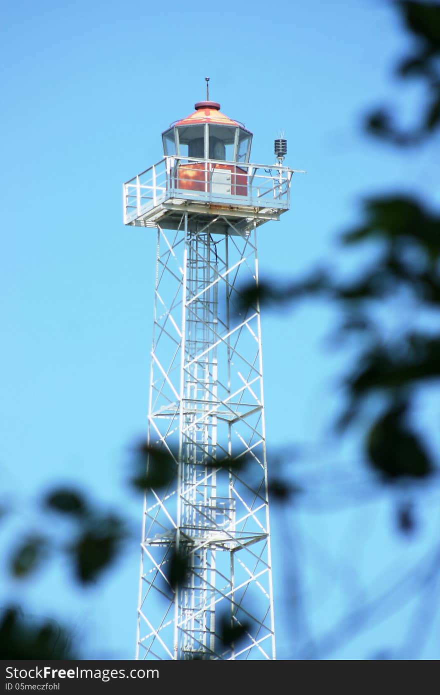 Lighthouse on the panjang island as the regulator of the sea freight traffic