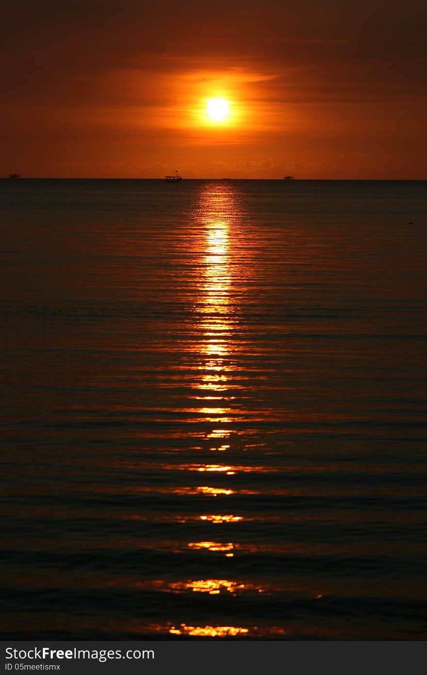 Beautiful sunset at beach located on the Promontory of the island of Java Karimun