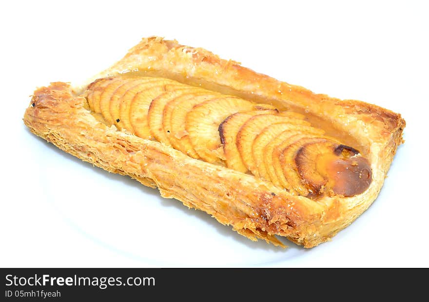 Puff pastry tart with natural apple slices gelatinous. Puff pastry tart with natural apple slices gelatinous